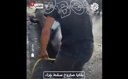 В Шхеме водой из шланга тушат иранскую ракету