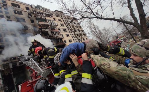 Последствия попадания артснаряда в многоэтажку на Оболони в Киеве (фото)
