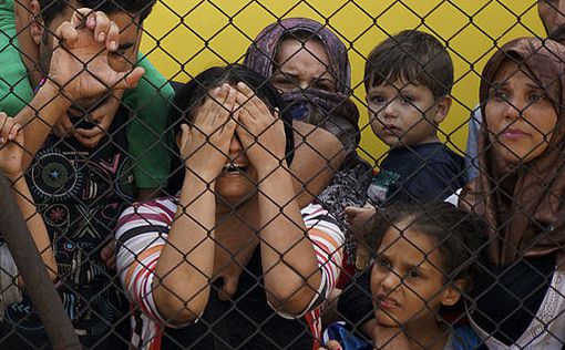 Бельгийский министр оштрафован за отказ впустить беженцев